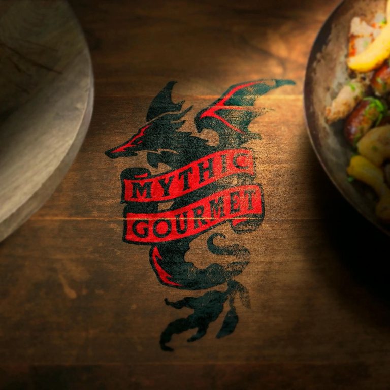 Mythic Gourmet logo on rustic wooden table with food